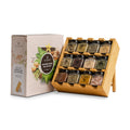 Tilz Collection Artisan Spice Library Wooden Reserve with twelve gourmet spice tins in a wooden rack