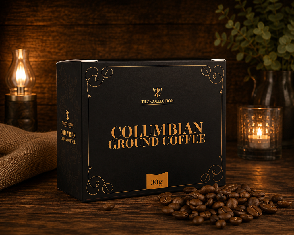 Tilz Collection Colombian Ground Coffee 30g box on rustic wooden surface with roasted coffee beans oil lamp and candle