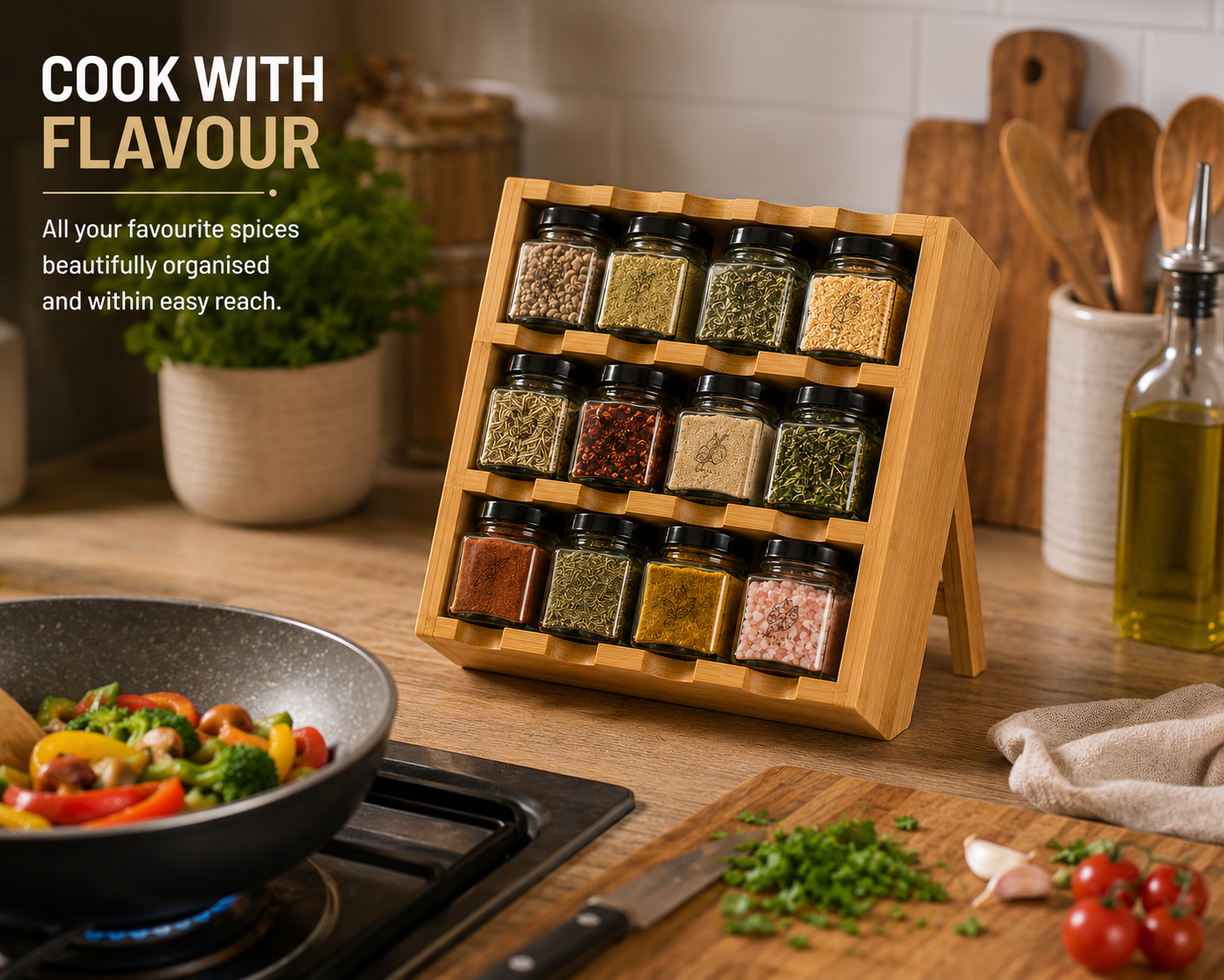 Tilz Collection Wooden Spice Rack Gift Set lifestyle cooking scene Cook With Flavour text 12 premium spice tins in wooden rack with stir fry pan fresh vegetables herbs garlic and olive oil on kitchen counter