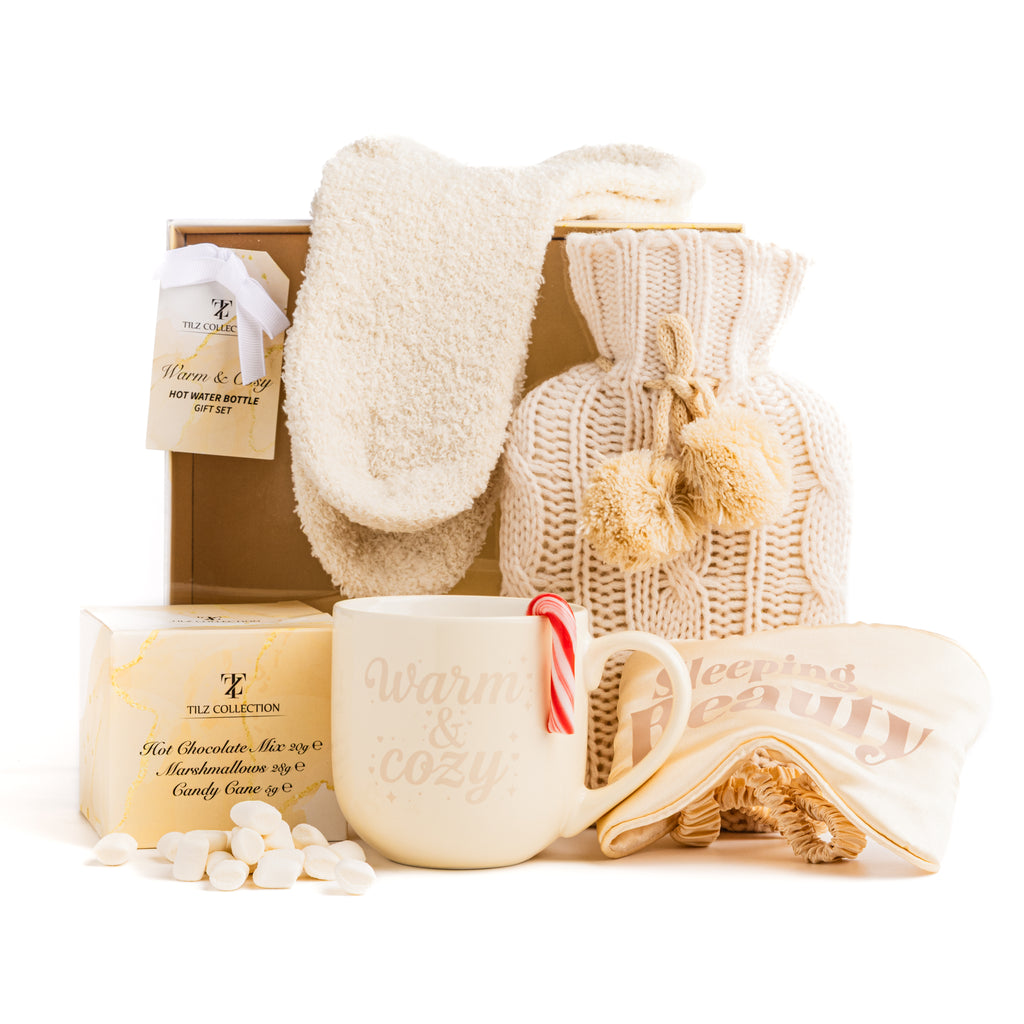 Tilz Collection Warm and Cosy Gift Set with hot water bottle, mug and socks in a neutral gift box